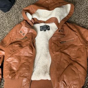 Faux leather jacket with faux fur inside